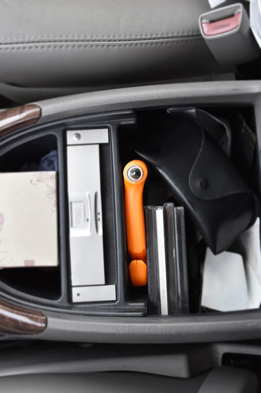 Automotive Emergency Tool With Seatbelt Cutter And Window Punch